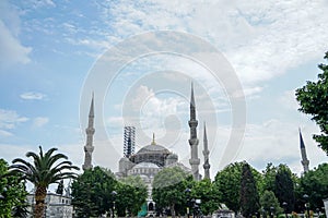 The blue mosque architectural landscape view showing heritage building restoration on blue sky background, Istanbul