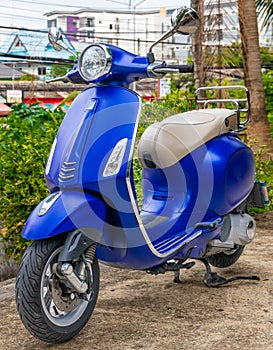 Blue Motor bike at Phuket town thailand. Sino Portuguese building.