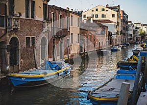 Blue boats on the Venetian Canal