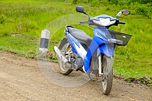 Blue motorcycle on the country road