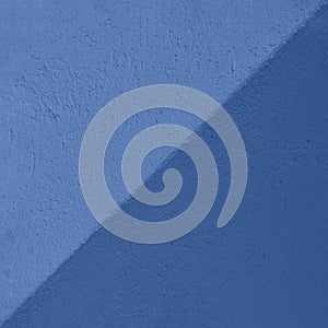 Blue and navy blue Textured Cement or concrete wall background. Deep focus