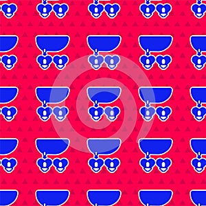 Blue Necklace with heart shaped pendant icon isolated seamless pattern on red background. Jewellery decoration