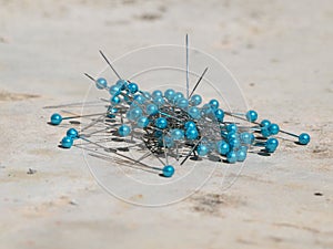 Blue needle pins