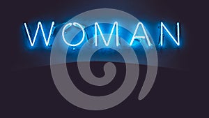 Blue neon sign of the word `Woman` on a black background