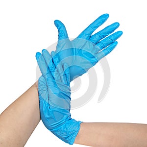 Blue nitrile medical gloves on hands isolated on the white