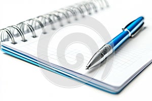A blue notebook and pen isolated on white background