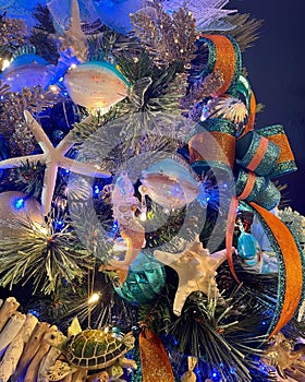 Blue Ocean themed Christmas tree closeup of decorations background