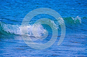 Blue ocean wave with splashes, Tenerife, Canary Islands.