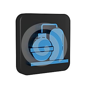 Blue Oil and gas industrial factory building icon isolated on transparent background. Black square button.
