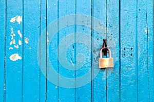 Blue old wood door with the lock