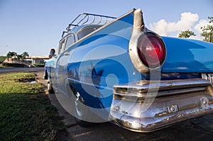 Blue oldtimer taxi in Cuba