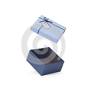 Blue open empty paper gift box isolated on white