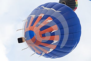 Blue and Orange Hot Air Balloon in the sky