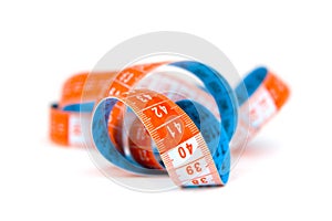 Blue and orange measuring tape