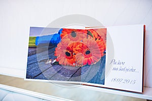 Blue and orange textile wedding photo book