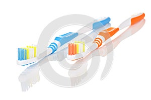 Blue and Orange Toothbrushes