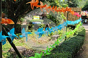 Toy windmill in the park