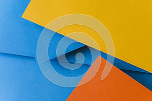 blue orange yellow color papers background. High quality photo