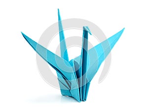 Blue origami bird.