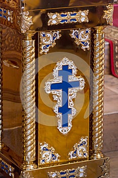 Blue Orthodox cross on Golden surface