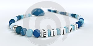 A blue pacifier chain for boys with name Elias