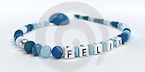 A blue pacifier chain for boys with name Felix
