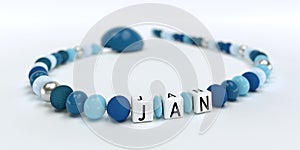 A blue pacifier chain for boys with name Jan