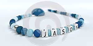 A blue pacifier chain for boys with name Jason