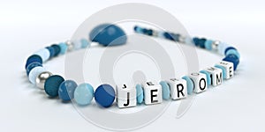 A blue pacifier chain for boys with name Jerome