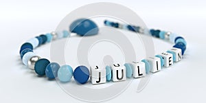 A blue pacifier chain for boys with name Julien