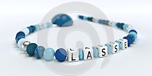 A blue pacifier chain for boys with name Lasse