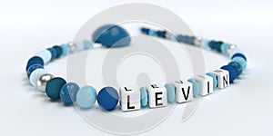 A blue pacifier chain for boys with name Levin