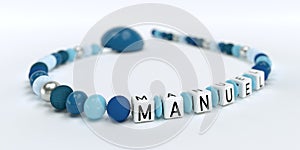 A blue pacifier chain for boys with name Manuel