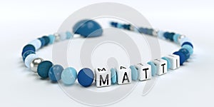 A blue pacifier chain for boys with name Matti