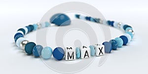 A blue pacifier chain for boys with name Max