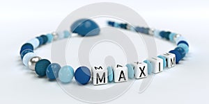 A blue pacifier chain for boys with name Maxim
