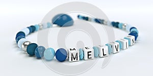 A blue pacifier chain for boys with name Melvin