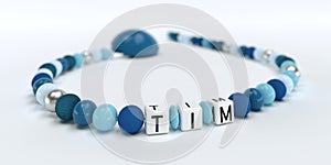 A blue pacifier chain for boys with name Tim