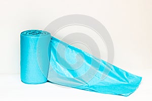 Blue packaging trash bags on a white background.