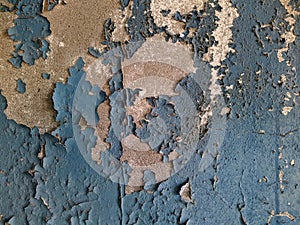 blue painted background texture of old chipped plaster on the concrete wall