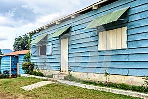 Blue painted clapboard or weatherboard siding on house exterior