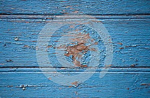 Blue painted shabby wooden plank surface