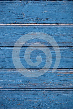 Blue painted shabby wooden plank surface