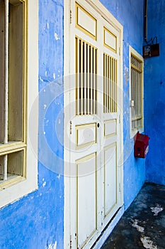 Blue painted shophouse facade