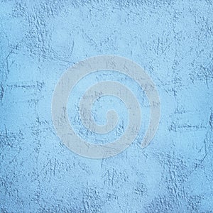Blue painted texture. Toned concrete wall background. Decorative plaster. Light blue abstract background