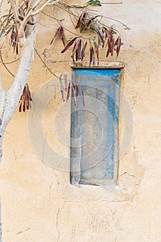 Blue painted window in the village of Faiyum