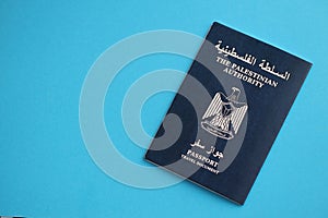 Blue Palestinian Authority passport on blue background close up