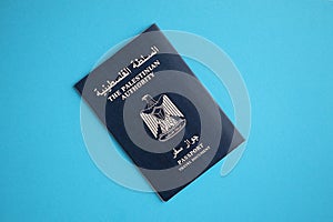 Blue Palestinian Authority passport on blue background close up