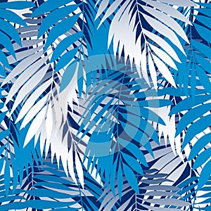 Blue palm leaves in a seamless pattern