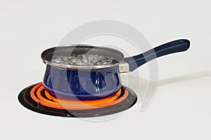 Blue Pan On Stove top Burner Boiling Water With Copy Space